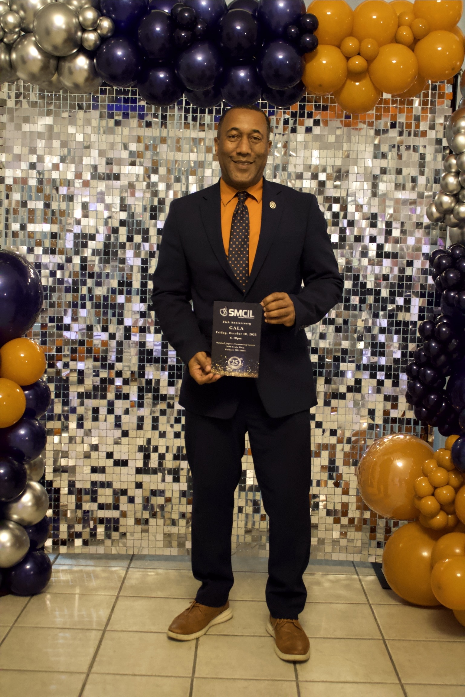 Gala Slideshow - Commissioner Ralph Patterson II with SMCIL program at shimmer wall