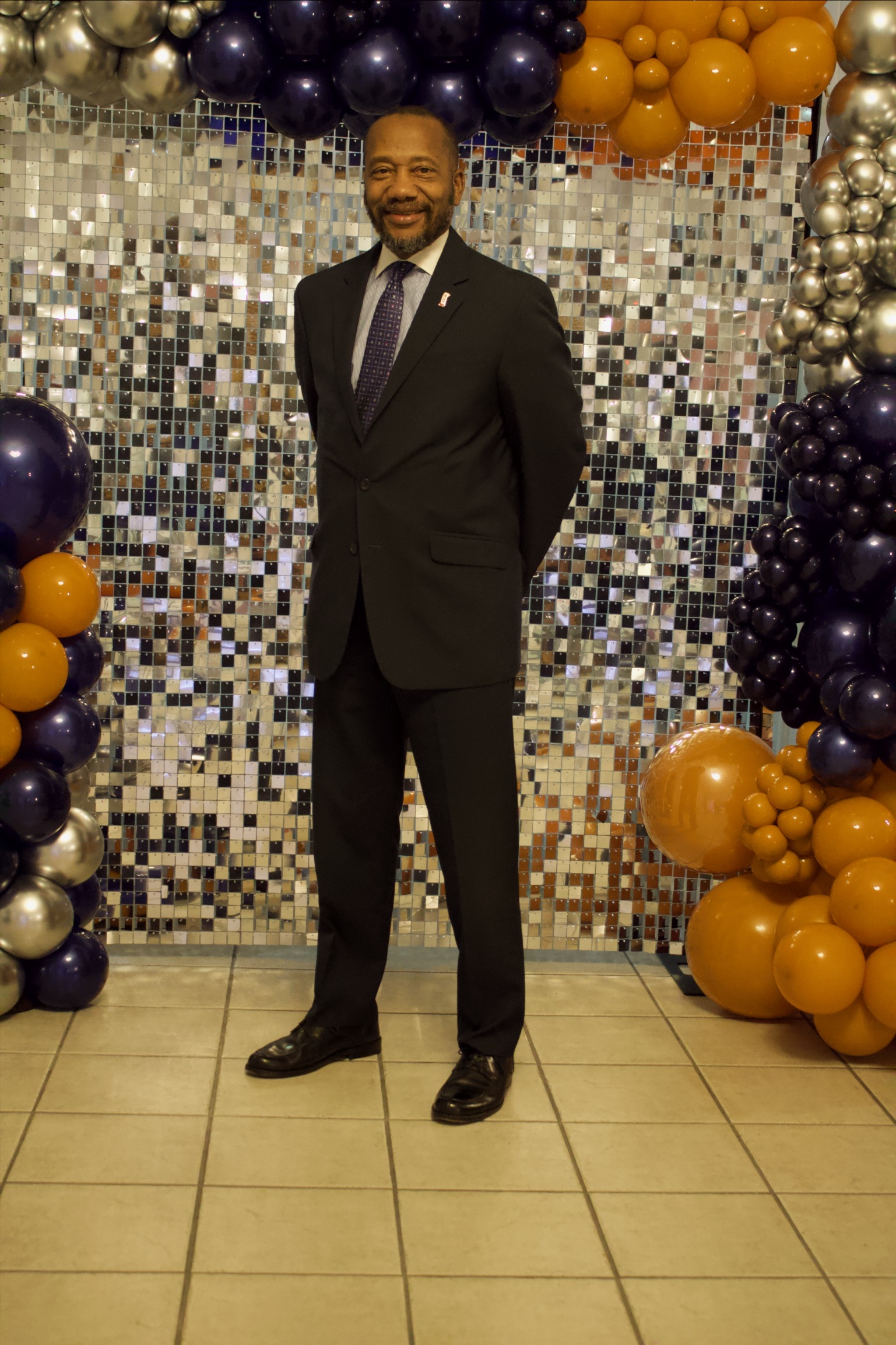 Gala Slideshow - Commissioner Reuben Collins II at shimmer wall